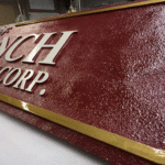 Dimensional Sandblasted with raised copy and lettering by Hanson Signs Wholesale Sign Manufacturer