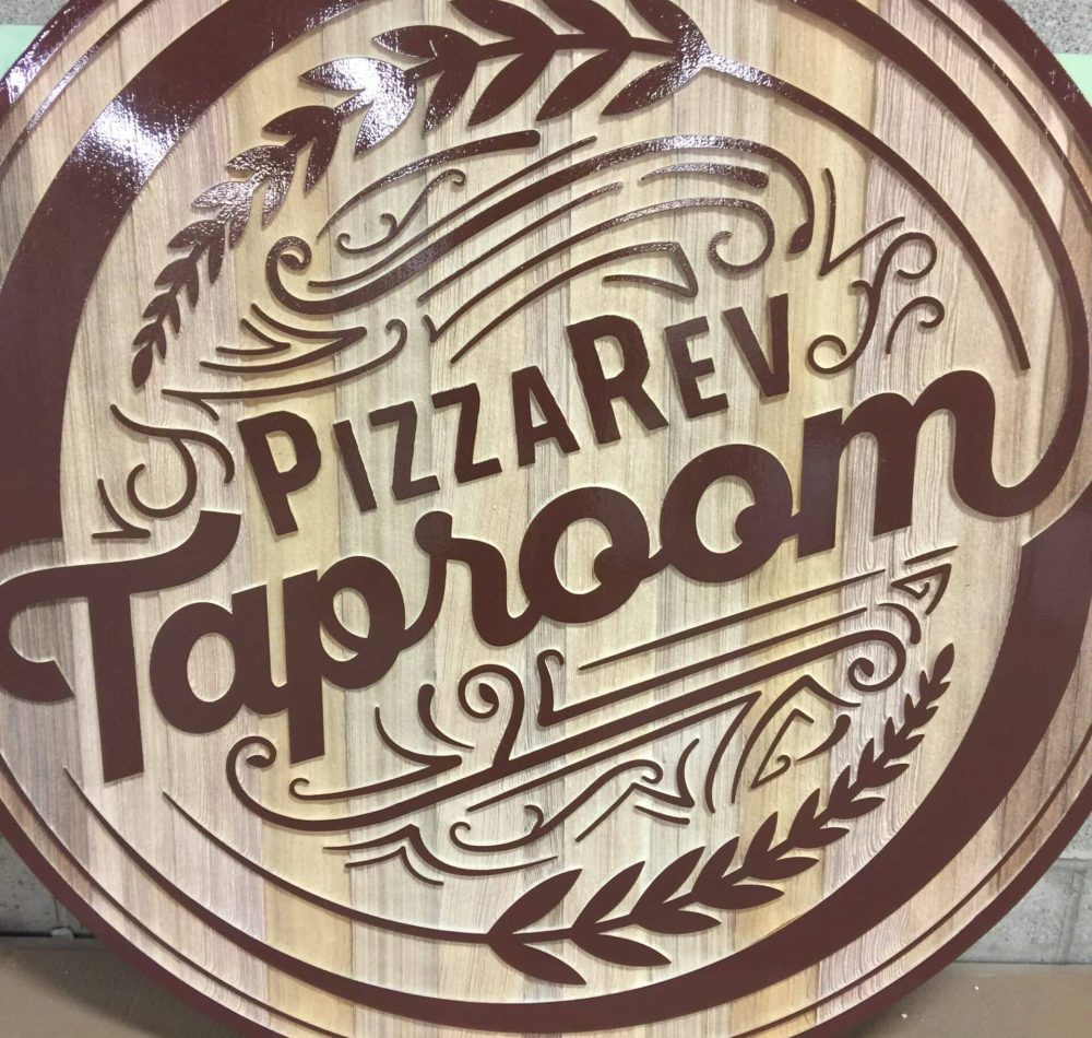 Cedar sand blasted dimensional sign with raised copy and lettering by Hanson Signs Wholesale Sign Manufacturer